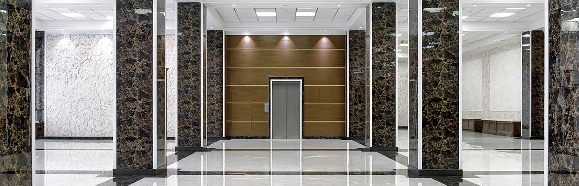 clean lobby with elevator door